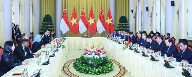 Le président vietnamien s'entretient avec son homologue singapourien en visite - Ảnh 3.