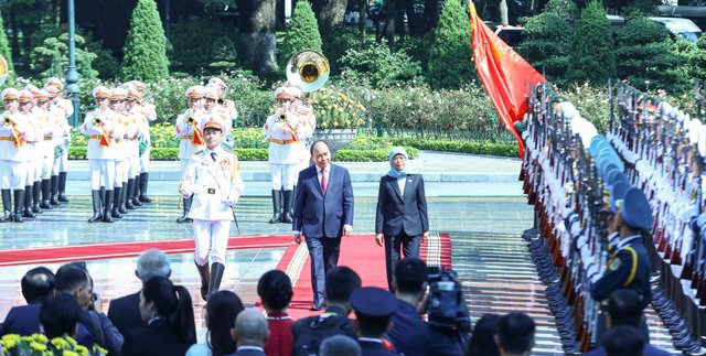 Le président vietnamien s'entretient avec son homologue singapourien en visite - Ảnh 1.